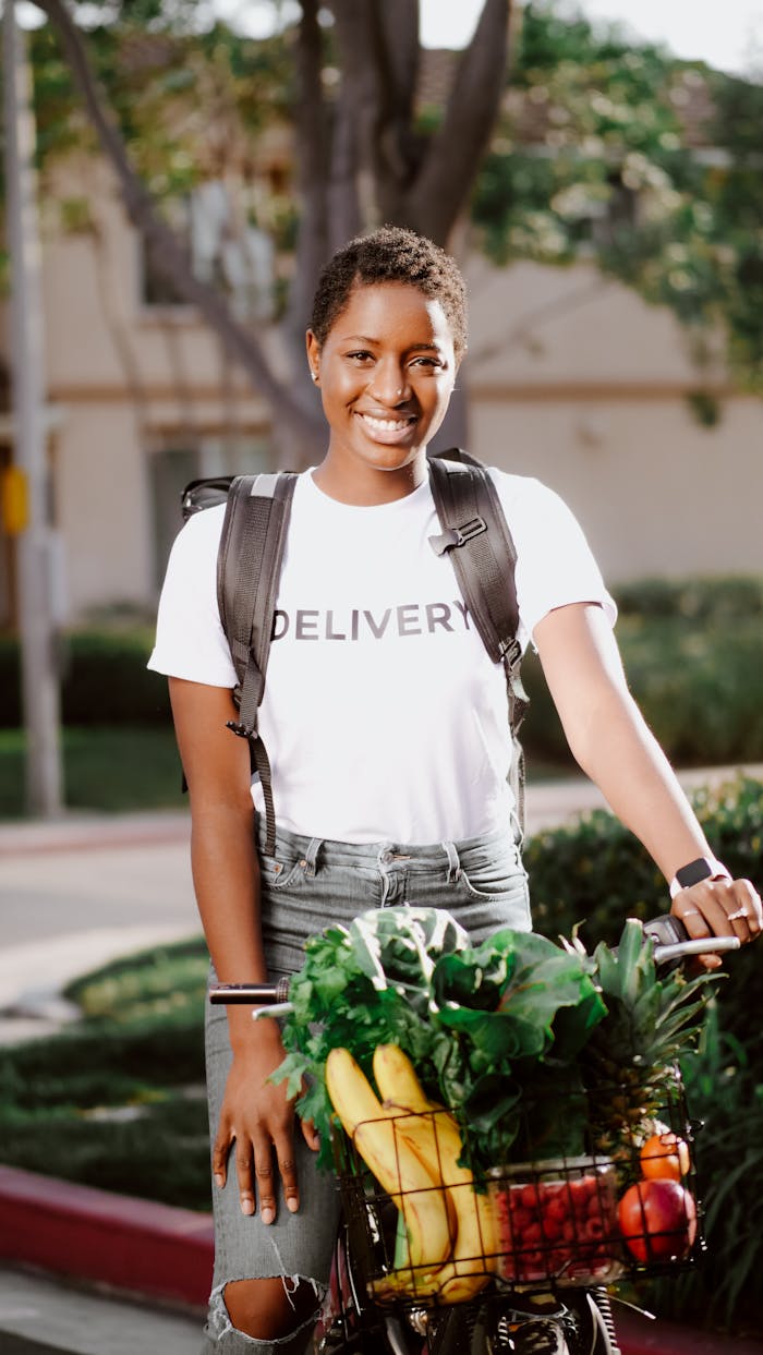 Crafting Captivating Headlines: Your awesome post title goes here Woman delivering fresh fruits and vegetables by bicycle in a suburban neighborhood.